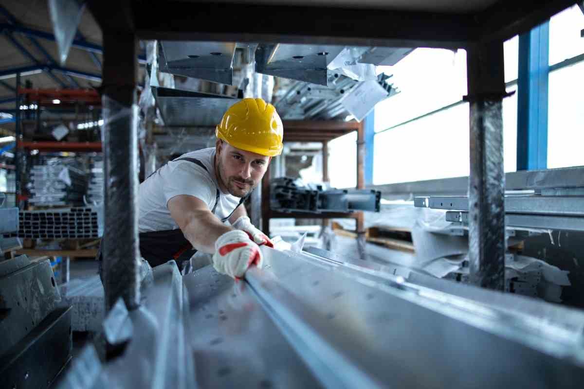 factory-worker-working-warehouse-handling-metal-material-production-50kb