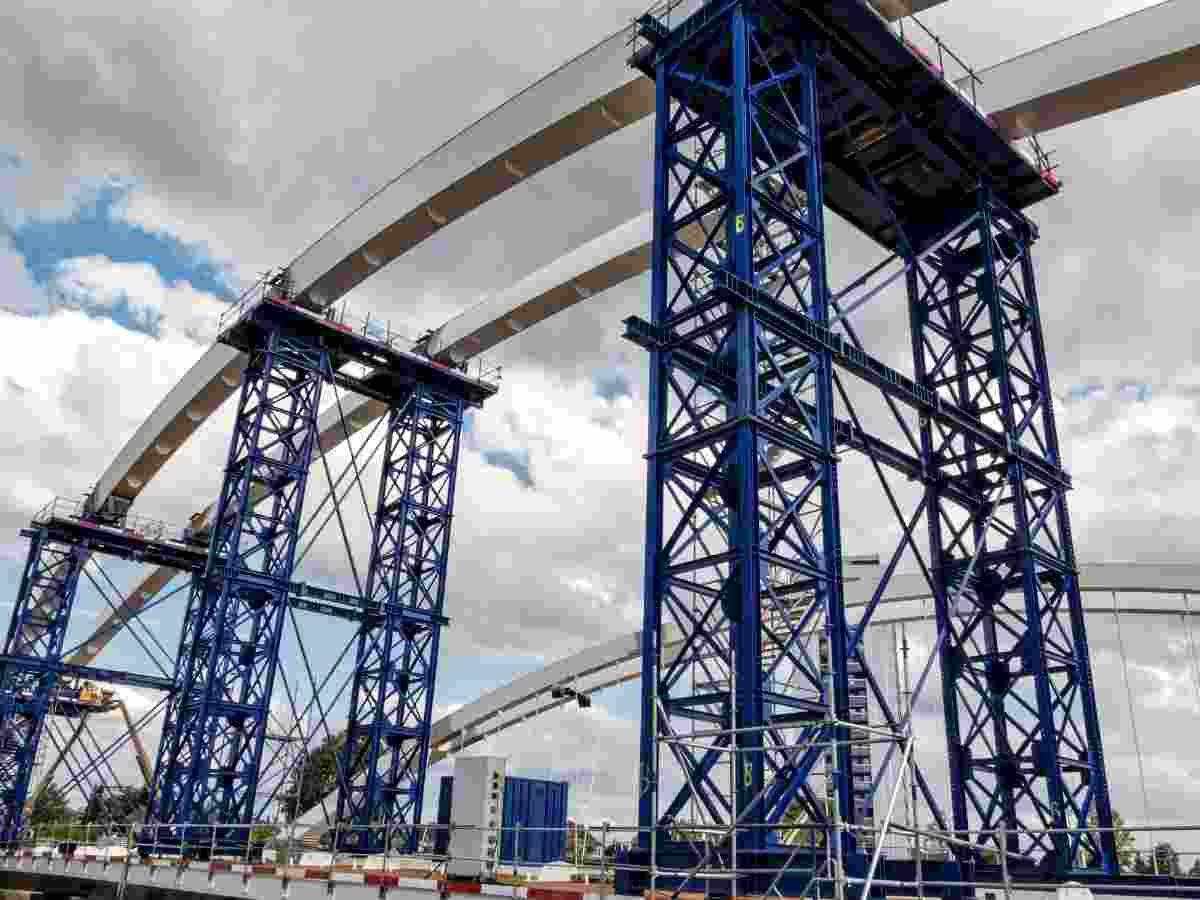 low-angle-view-bridge-against-sky-city-50kb